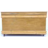 A pine blanket chest, with metal carry handles to the sides, interior painted green, with lift out