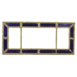 An early 19th sectional wall mirror, gilt bead and reel moulded frame with inset blue glass borders,