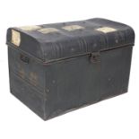 An early 20th century metal travelling trunk, with various shipping labels, some for ?Stamford?,