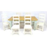 A modern pine kitchen dining table, pale green painted legs, 91.5 by 183 by 79.5cm high together