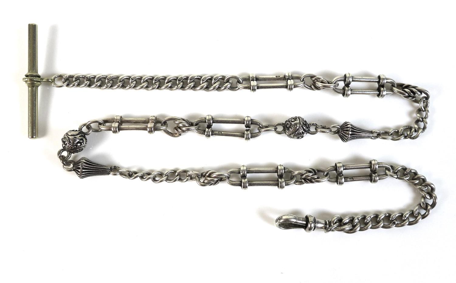 An Edwardian silver fancy link fob chain, with T bar and clasp, 42cm long, 26.7g.