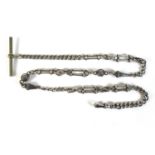 An Edwardian silver fancy link fob chain, with T bar and clasp, 42cm long, 26.7g.