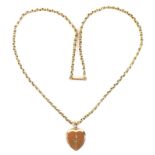 A 9ct gold heart shaped pendant locket, with starburst decoration and a diamond chip to the