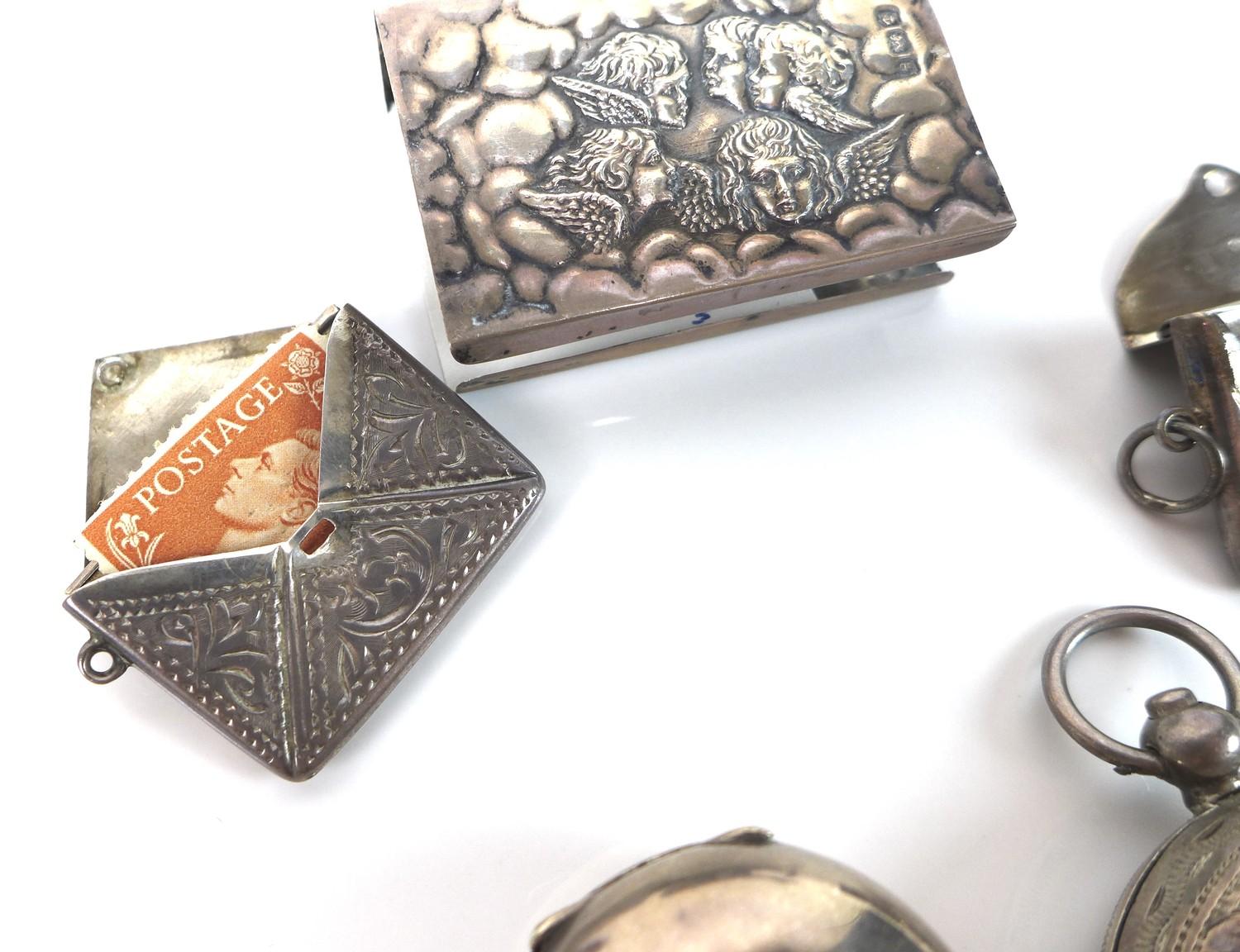 A group of Edwardian silver vertu items, comprising two sovereign holders, two stamp holders, and - Image 4 of 7