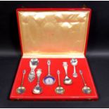 A cased set of Danish commemorative silver spoons, comprising a Christian IX and Queen Louise