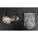 A George V silver decanter label, of kidney form with line border, engraved 'Brandy', Atkin