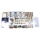 A group of coins, including a 1935 rocking horse crown, a 2012 £5 coin, a 2005 Trafalgar £5 coin,