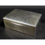 A 20th century Chinese silver cigarette box, with blank cartouche bamboo decoration to its lid, as