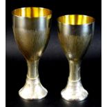 A pair of Christopher Nigel Lawrence limited edition modernist silver goblets, of waisted form