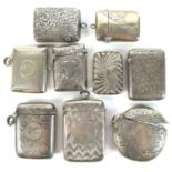 A group of Edwardian silver vesta cases, including a round example with engraved swirling