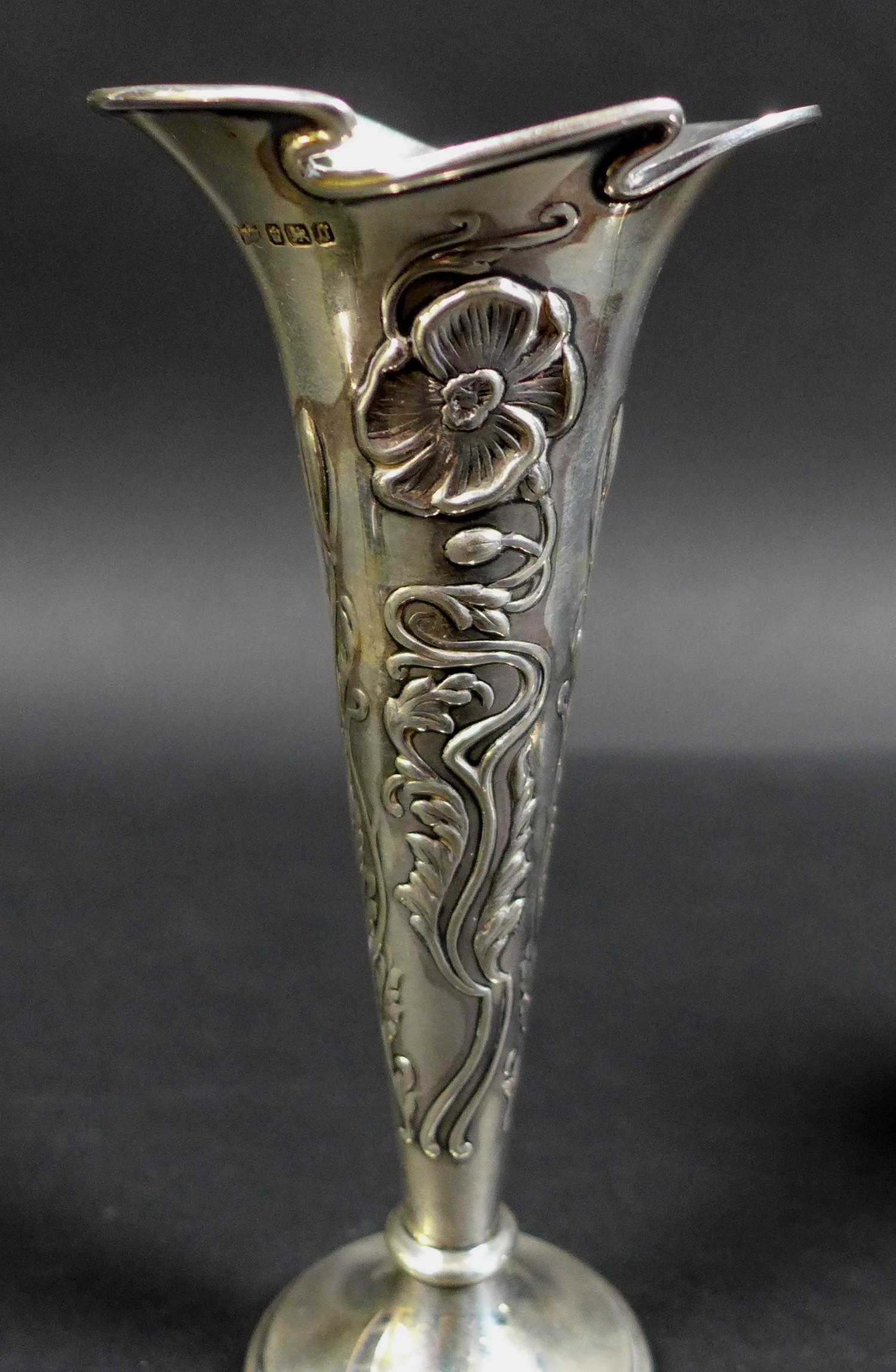 A pair of Edward VII Art Nouveau silver spill vases, with whiplash shaped rims and relief floral - Image 4 of 6