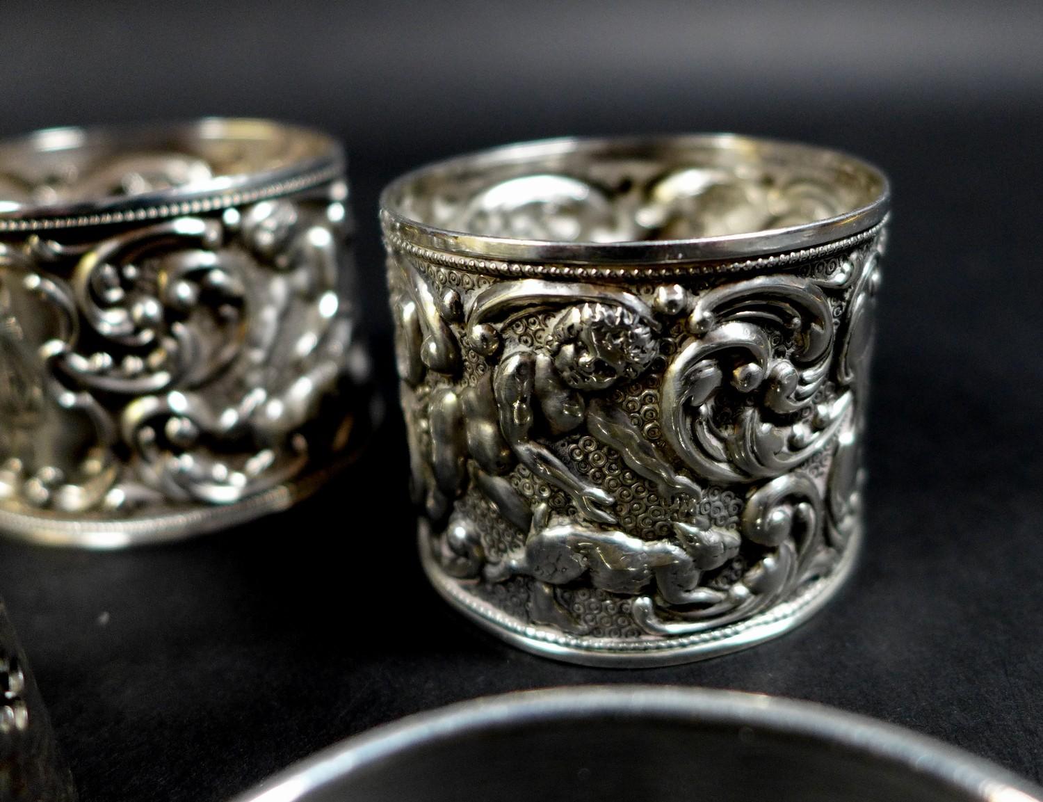 A collection of Edwardian and later silver napkin rings, including three Edwardian rings, two with - Image 2 of 6