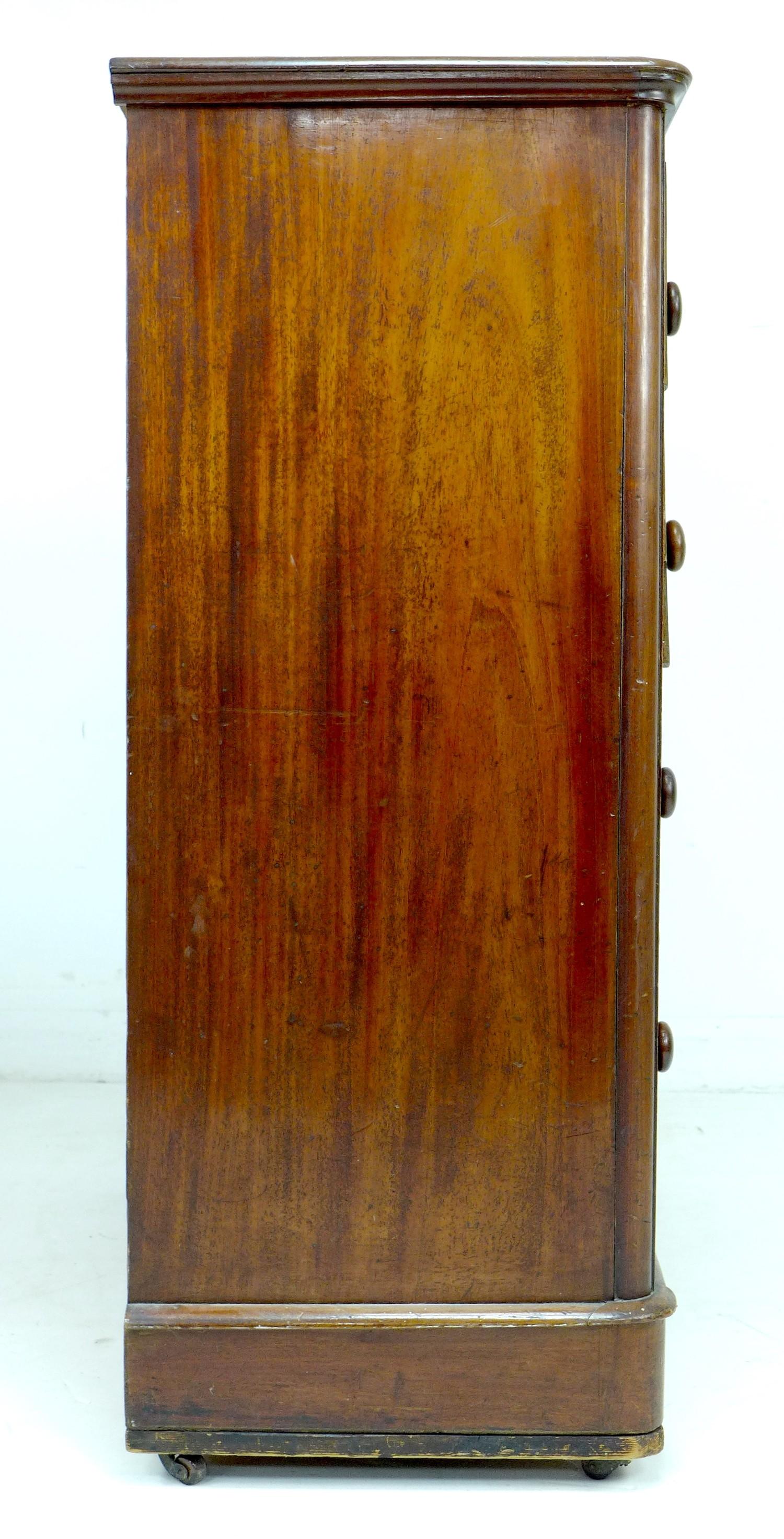 A Victorian mahogany chest, of two short over three long drawers, with turned handles, on small - Image 5 of 5