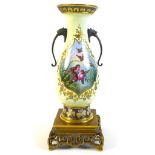 A gilt metal mounted porcelain vase, probably Chinese, early 20th century, decorated with a