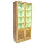 A mid century oak veneered twin glazed bookcase, 31 by 77 by 164cm high.