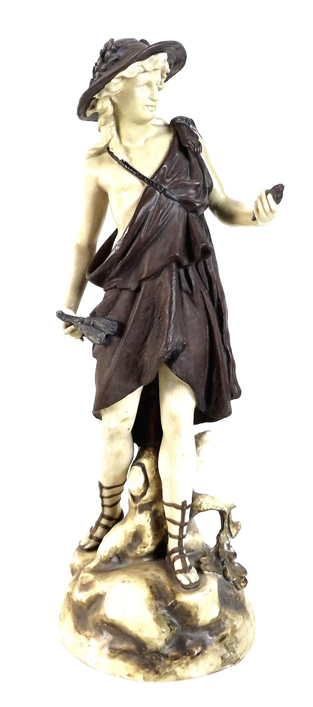 A Rudolstadt ivory porcelain figurine, modelled as a male dressed in a bear skin and carrying a