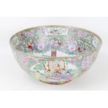 A modern Chinese Canton porcelain punch bowl, typically decorated with reserves depicting figures in