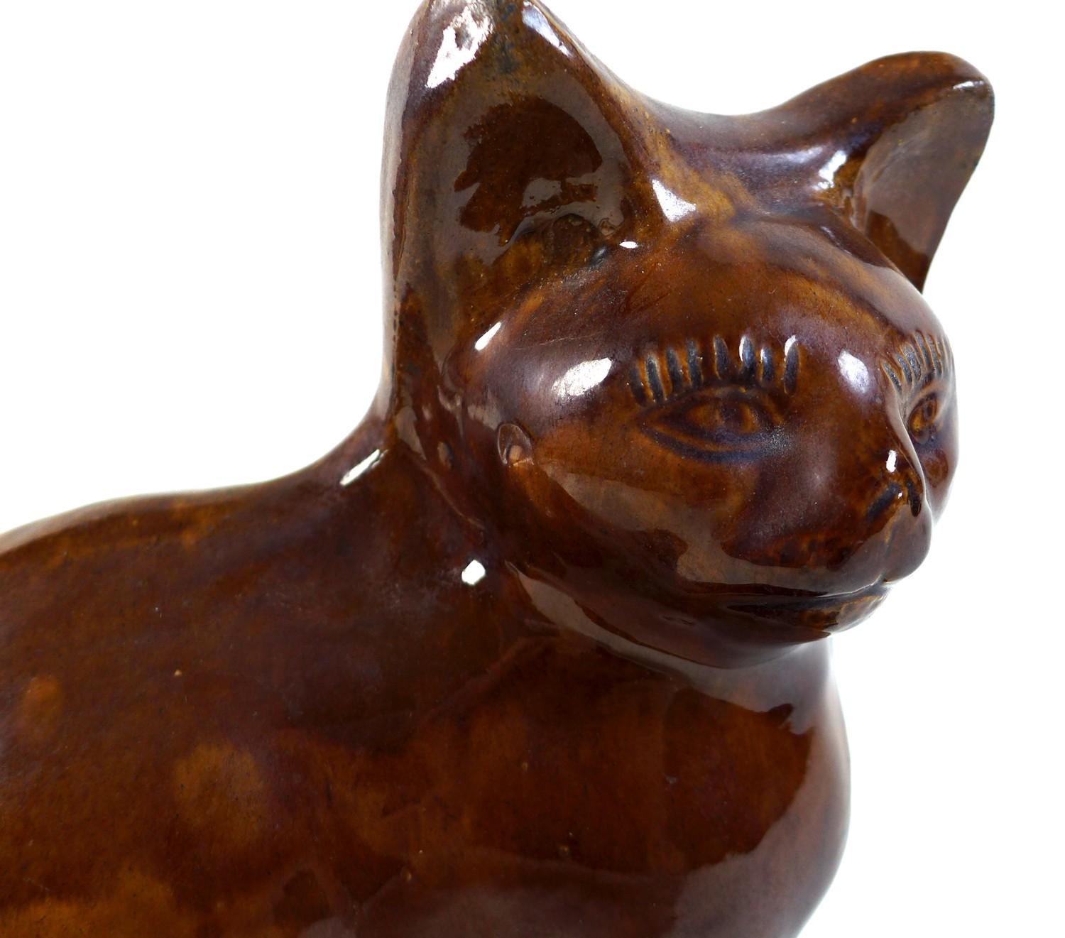 A rare treacle glazed pottery figure, mid to late 19th century, probably Canney Hill Pottery, Bishop - Image 8 of 10