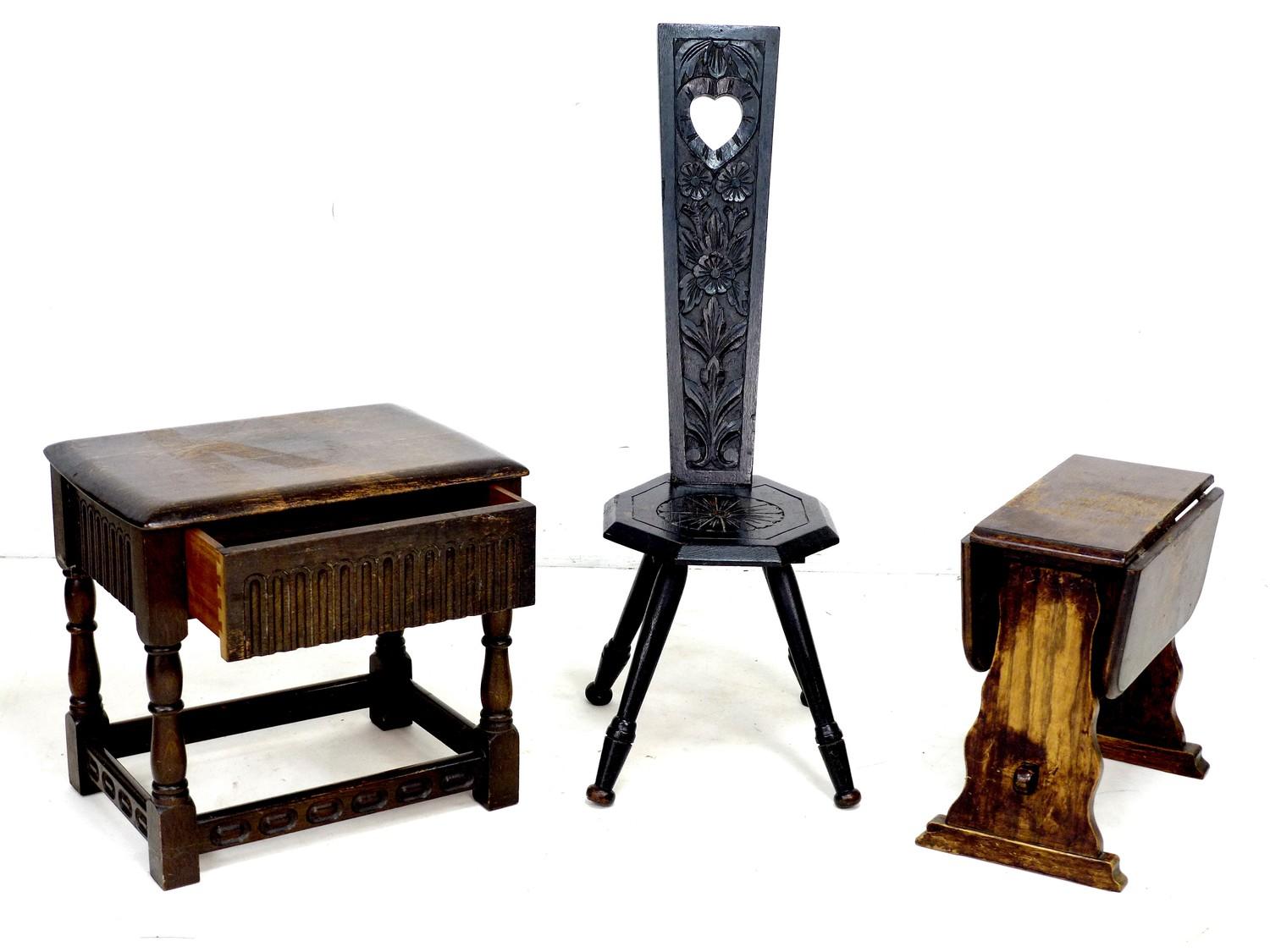A group of three pieces of modern furniture, comprising a low chair with carved decoration, 50