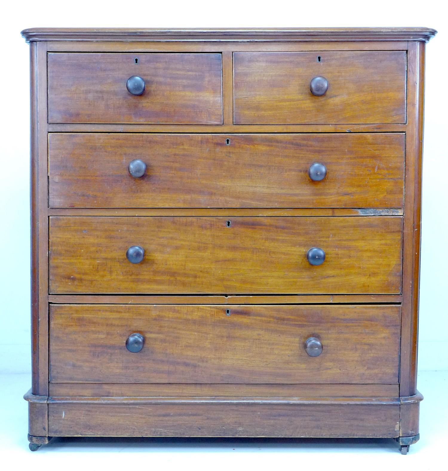 A Victorian mahogany chest, of two short over three long drawers, with turned handles, on small - Image 2 of 5