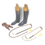 A collection of equestrian related items, comprising a pair of ladies leather knee length riding