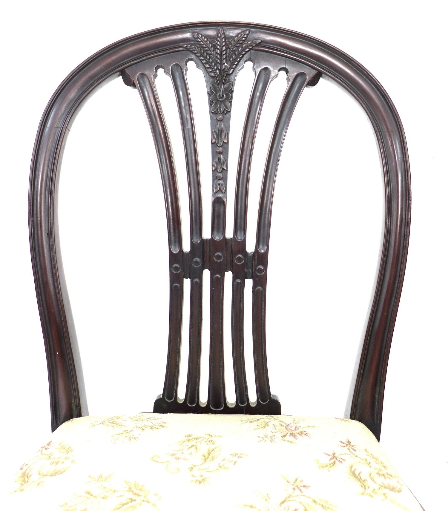A group of three Georgian mahogany dining chairs, comprising a Hepplewhite style carver with black - Image 3 of 5