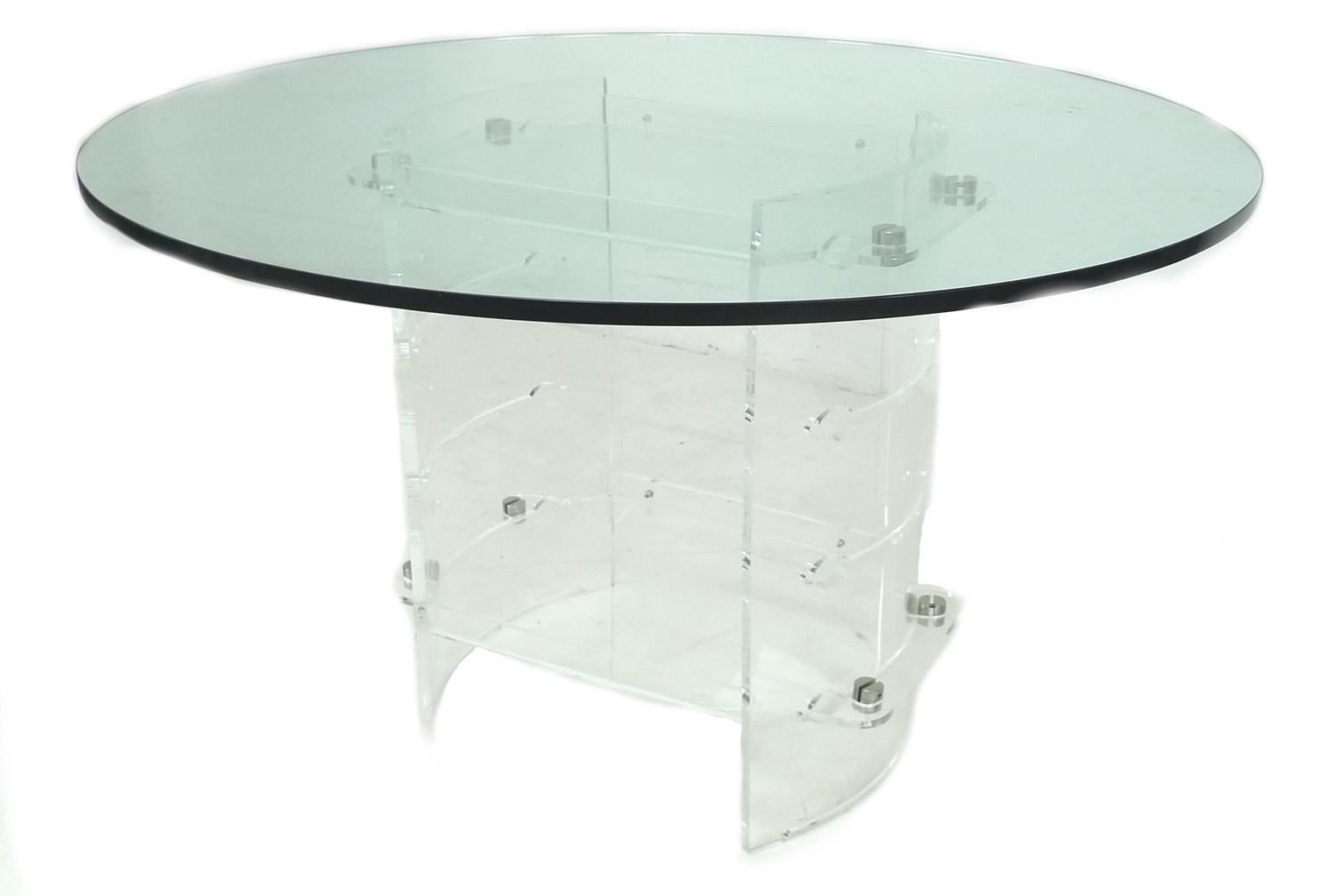 A modern design table, with circular surface and perspex base, 122 by 122 by 73.5cm high.