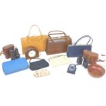 A group of collectables including three retro handbags and two pairs of vintage binoculars, and a