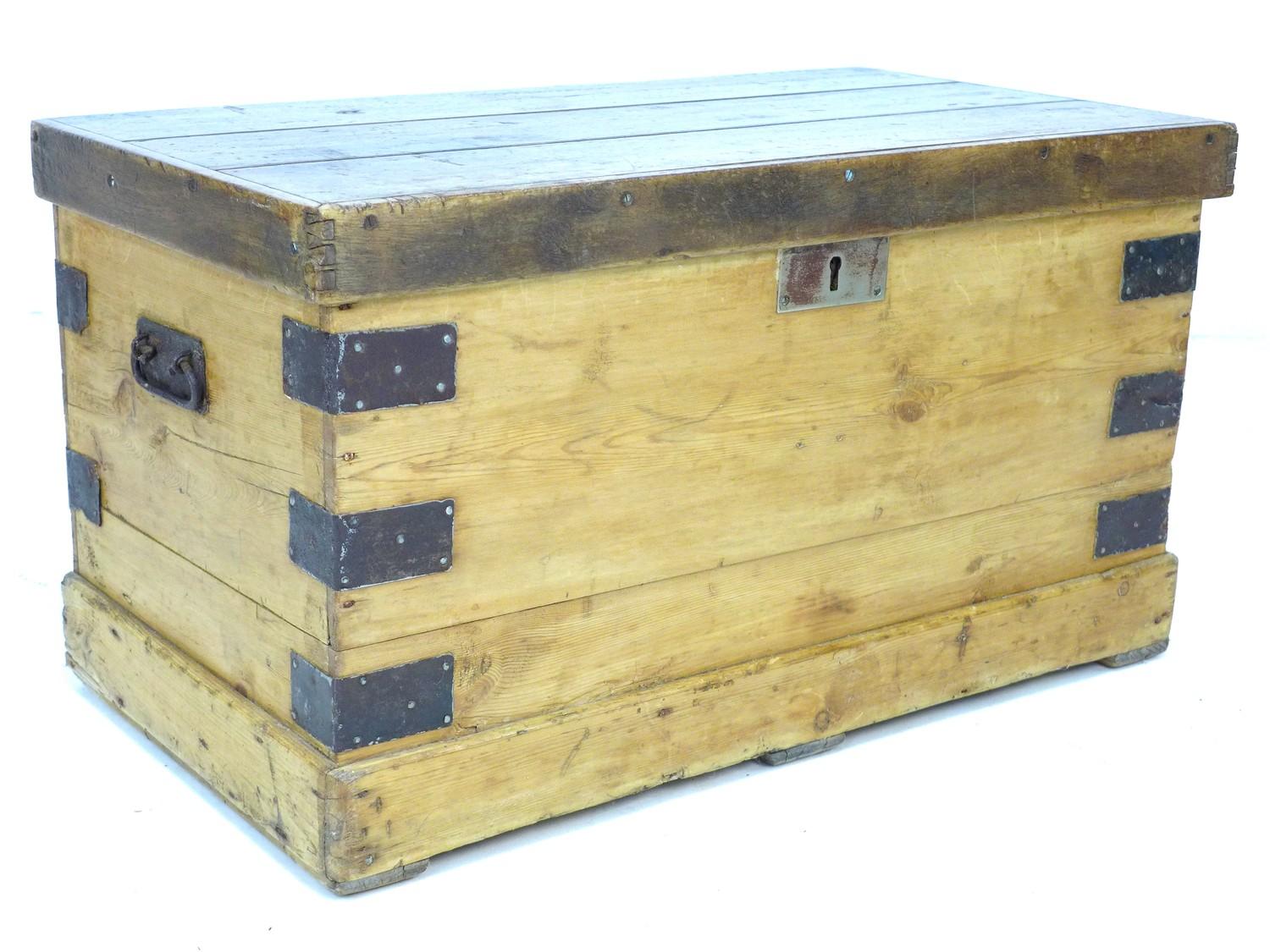 A Victorian pine and mahogany chest, with metal corners and carry handles, 72 by 41 by 40cm high.