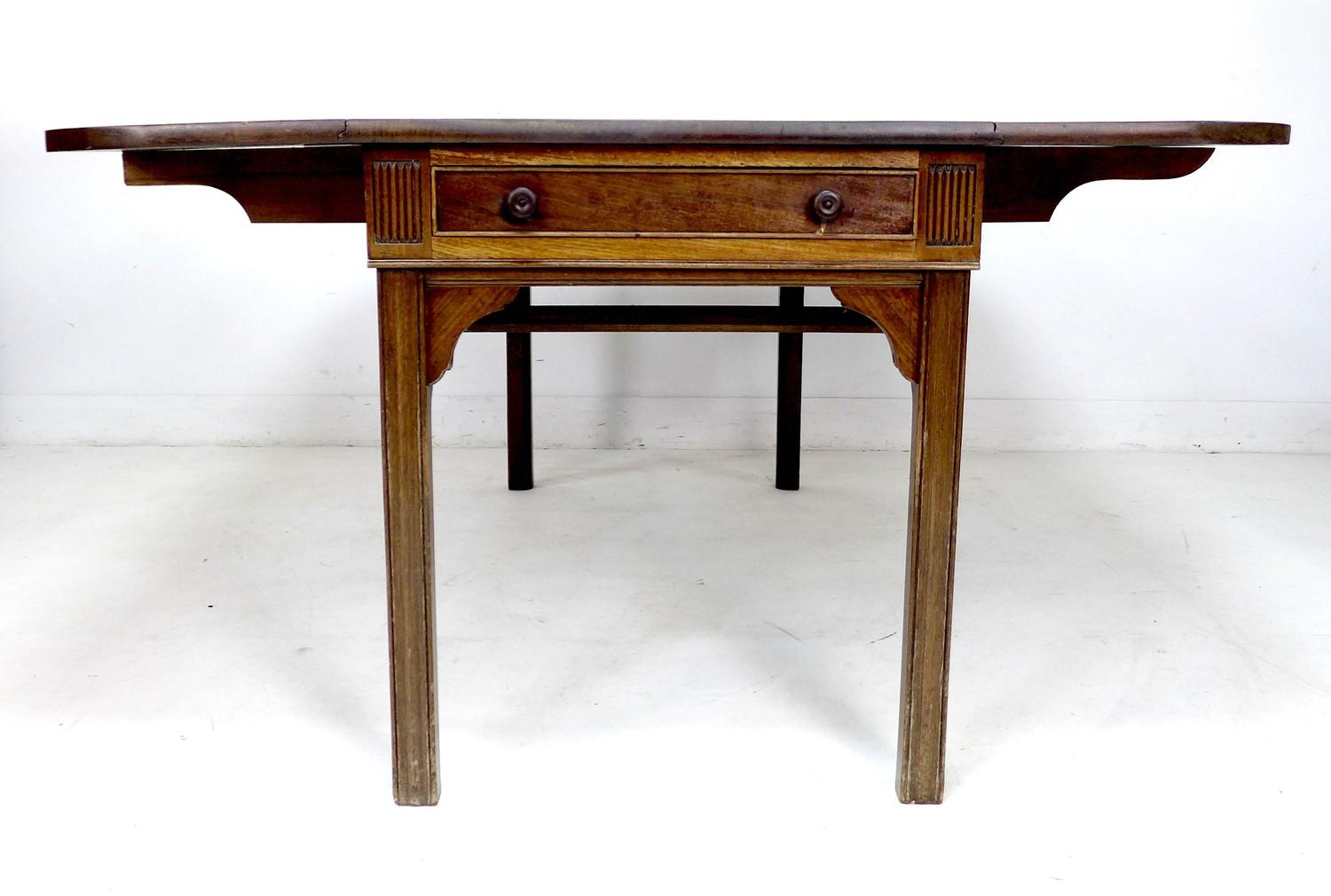 A George III mahogany drop leaf table, of long narrow form with single drawer, raised on - Image 5 of 7