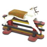 A mid 20th century small hand painted wooden rocking horse, with padded seat, 87 by 44 by 64cm high.