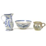 A group of studio pottery ceramics, comprising a bowl decorated in blue and white, with impressed LL