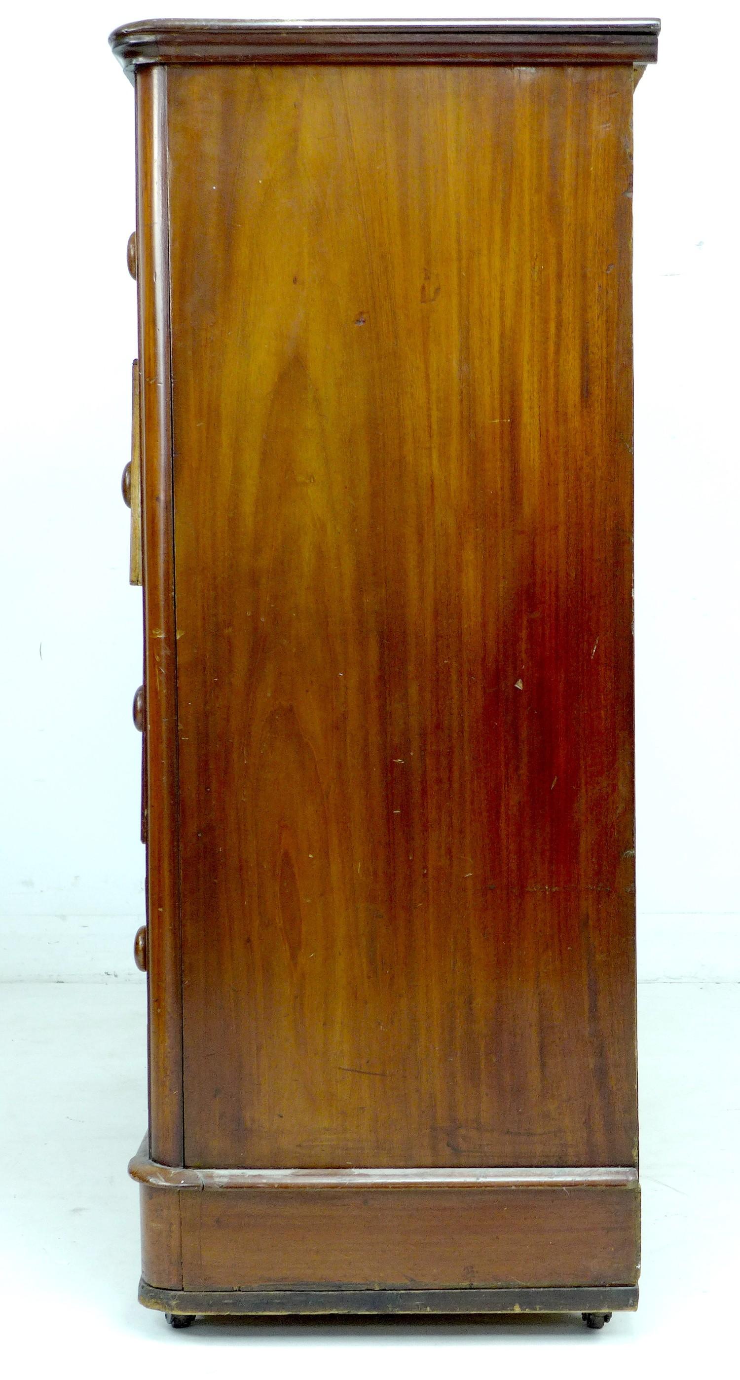 A Victorian mahogany chest, of two short over three long drawers, with turned handles, on small - Image 3 of 5