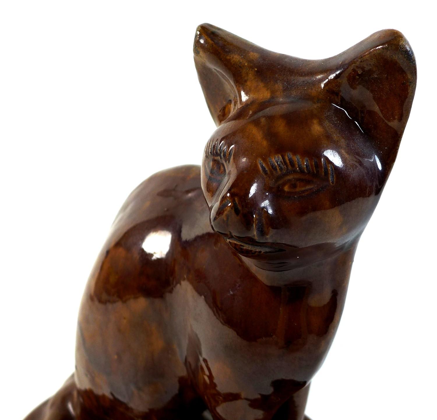 A rare treacle glazed pottery figure, mid to late 19th century, probably Canney Hill Pottery, Bishop - Image 9 of 10