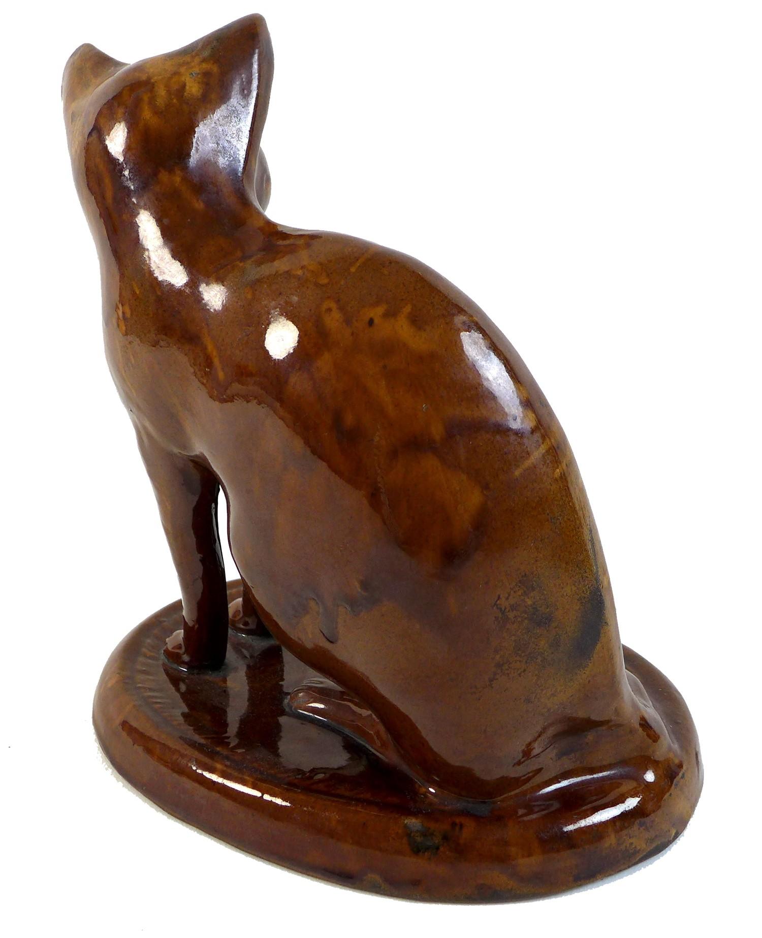 A rare treacle glazed pottery figure, mid to late 19th century, probably Canney Hill Pottery, Bishop - Image 2 of 10