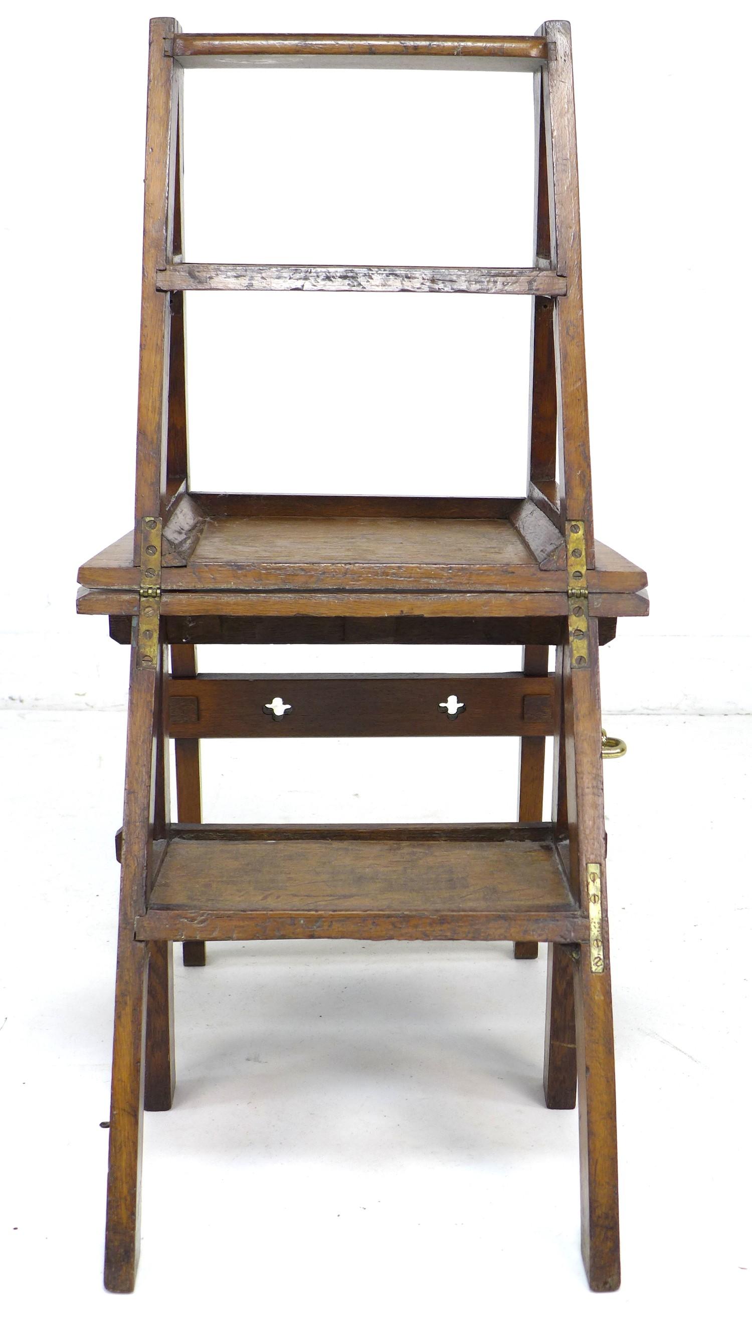 A set of oak metamorphic library steps, folding into a chair, the top rail with pierced quatrefoil - Image 10 of 10