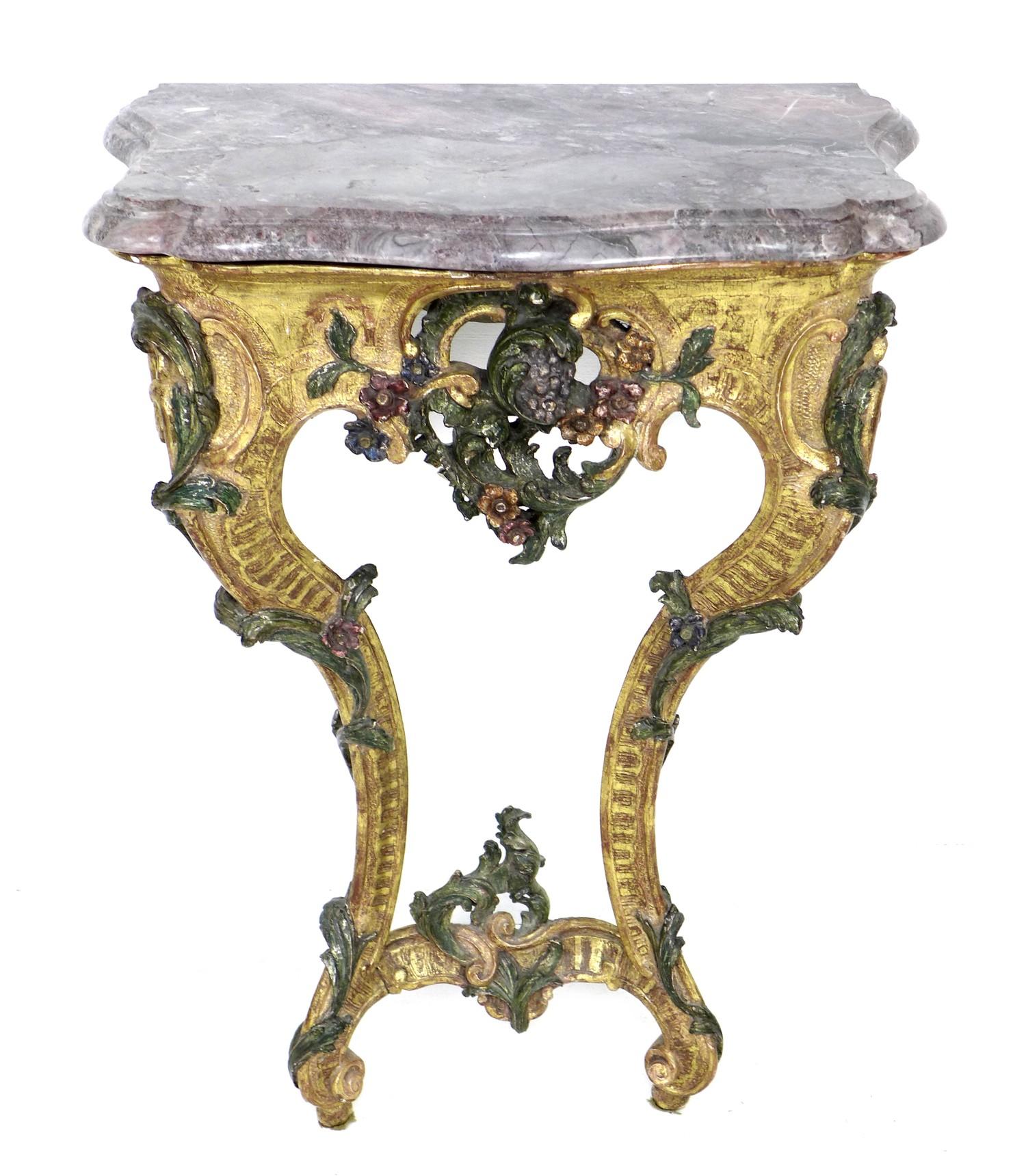 An 18th century Continental marble topped giltwood pier table, possibly Italian, with polychrome