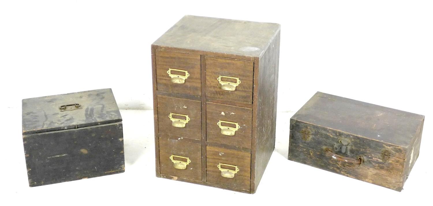 A vintage bank of six filing drawers, with brass handles, together with two wooden storage boxes. (