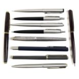 A collection of writing instruments, mostly Parker pens, comprising a Stirling Silver Parker pen,