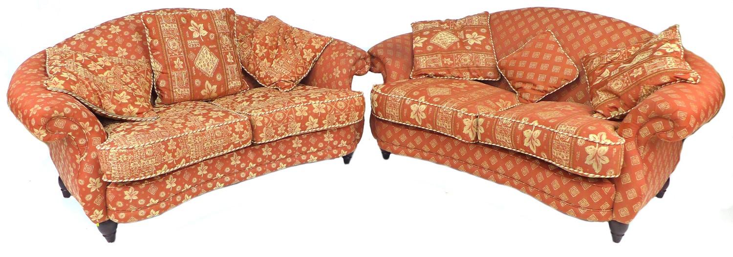 A pair of modern two seater sofas, with red and cream upholstery 186 by 100 by 92cm high. (2)