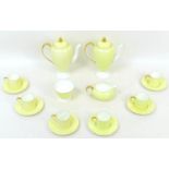 A 1930s Wedgwood coffee set in lemon yellow, pattern no. 'W4098', comprising two coffee pots, both