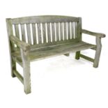 A modern wooden garden bench, slat back and open arms, 154 by 60 by 94.5cm high.