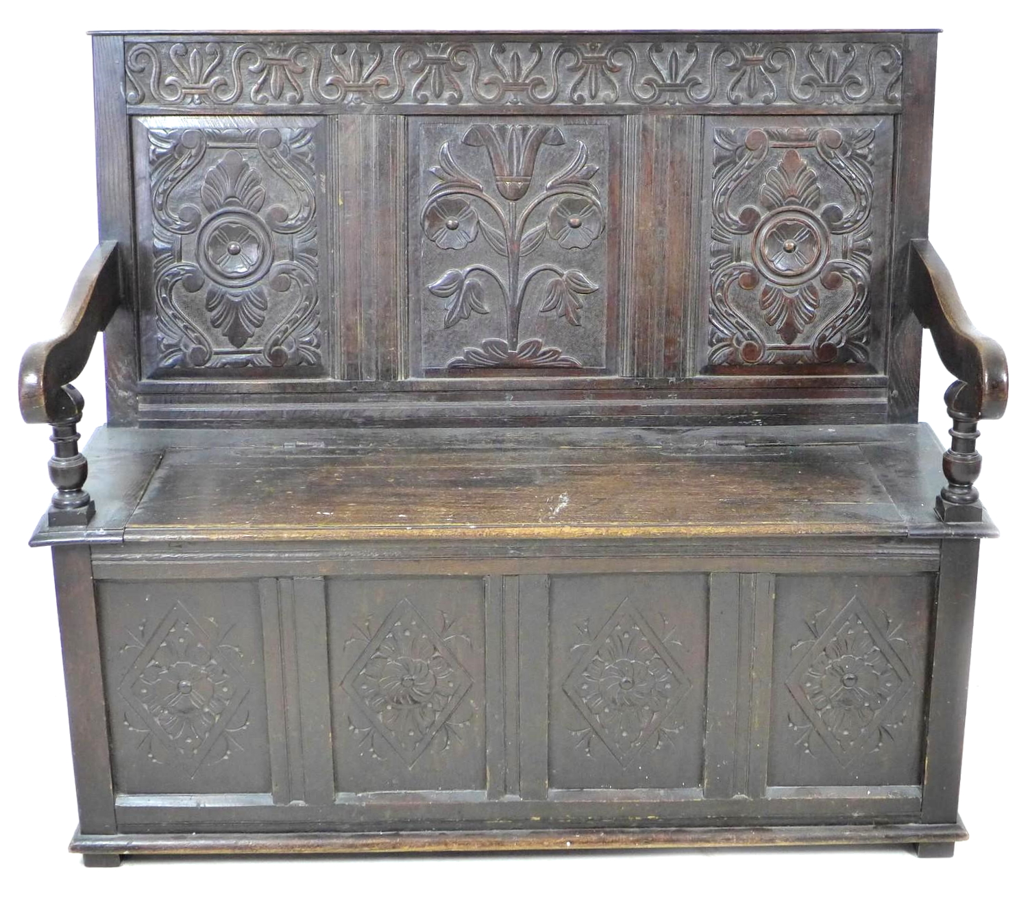 An 18th century oak settle, with carved frieze above a three panel carved back, open shaped - Image 2 of 8