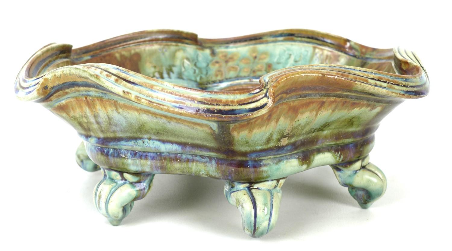John Calver (British, 20th century): a large wavey edged studio pottery dish, of typical form,