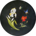A 19th century Italian pietra dura plaque, of circular form depicting a white iris and a red poppy