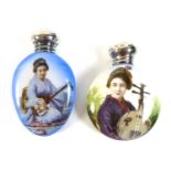 Two Victorian ceramic scent bottles, one oval form the other circular form, each decorated with a