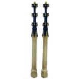 A pair of 20th century Gothic ecclesiastical carved wooden spires form columns, both hand painted in