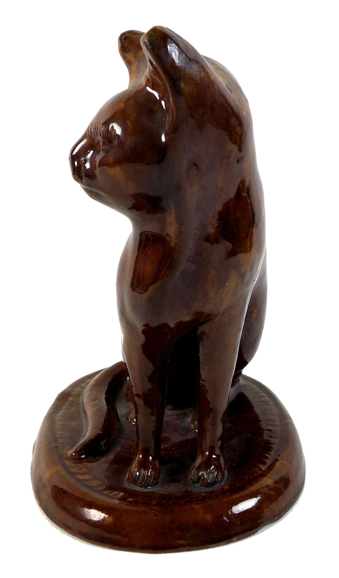 A rare treacle glazed pottery figure, mid to late 19th century, probably Canney Hill Pottery, Bishop - Image 3 of 10