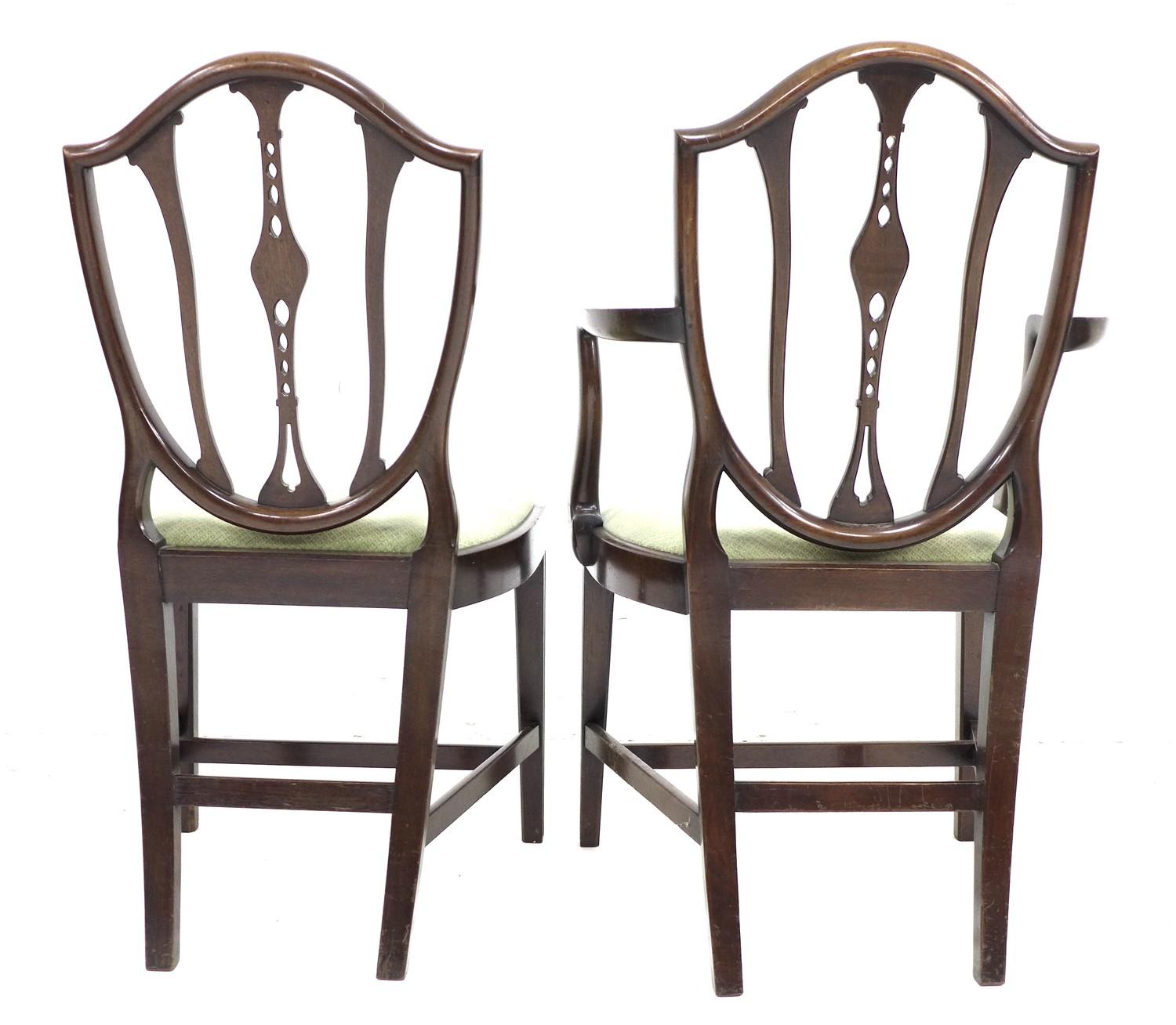 A set of five reproduction Georgian style mahogany dining chairs, with shield shaped carved and - Image 4 of 4