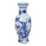 A Chinese porcelain vase, Qing Dynasty, 19th century, of baluster form with stepped rim, decorated